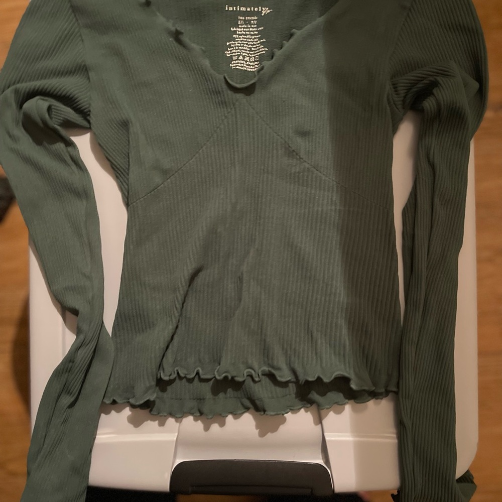 Green long sleeve crop top. Size XS. From Free People